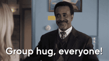 GIF saying, &quot;Group hug, everyone!&quot;