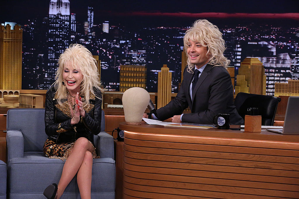 Dolly with Jimmy Fallon, who is wearing her wig