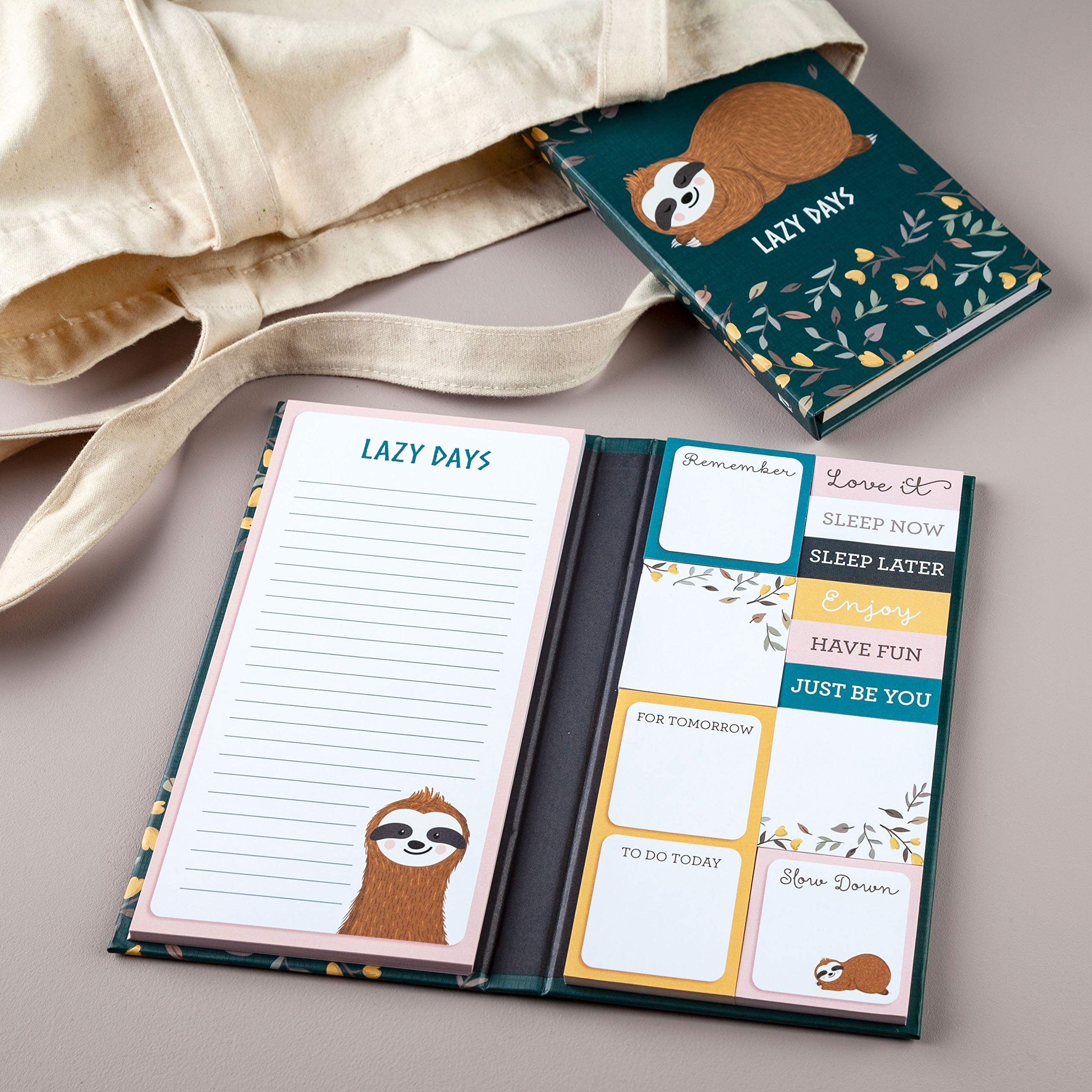 The sloth note set beside a tote bag