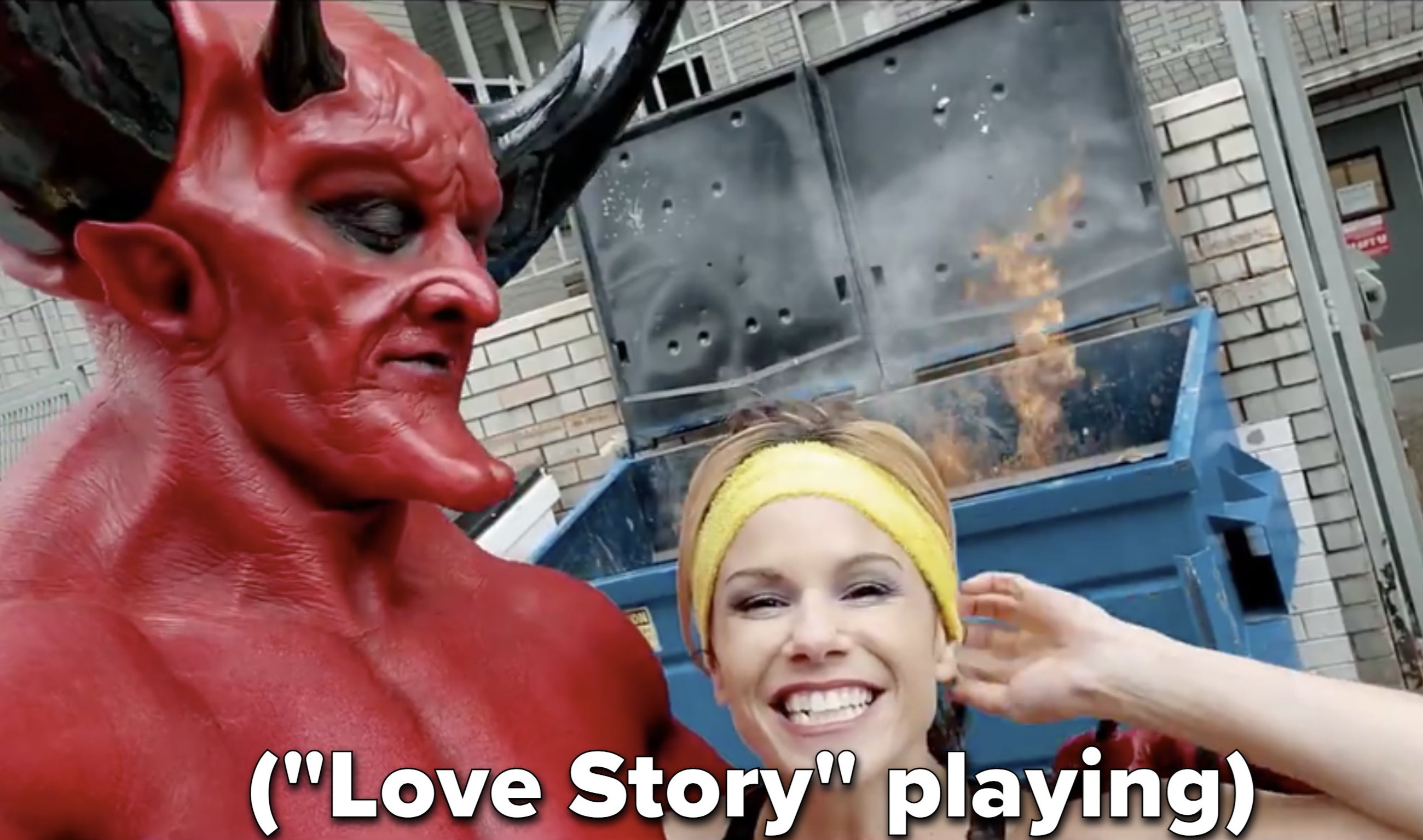 The Devil and 2020 pose in front of a dumpster fire while "Love Story" plays