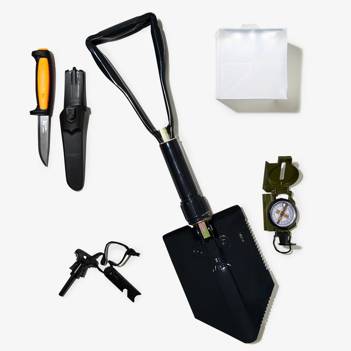 Flatlay image of the kit with the five tools