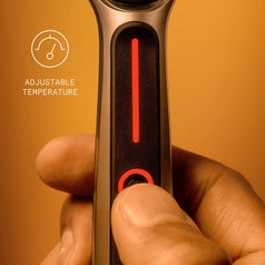close up showing temperature controls on heated razor
