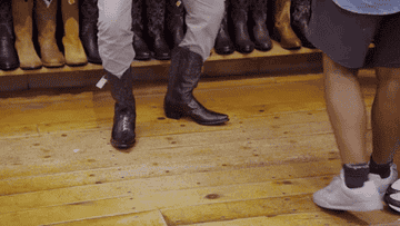A gif of a person dancing in cowboy boots.