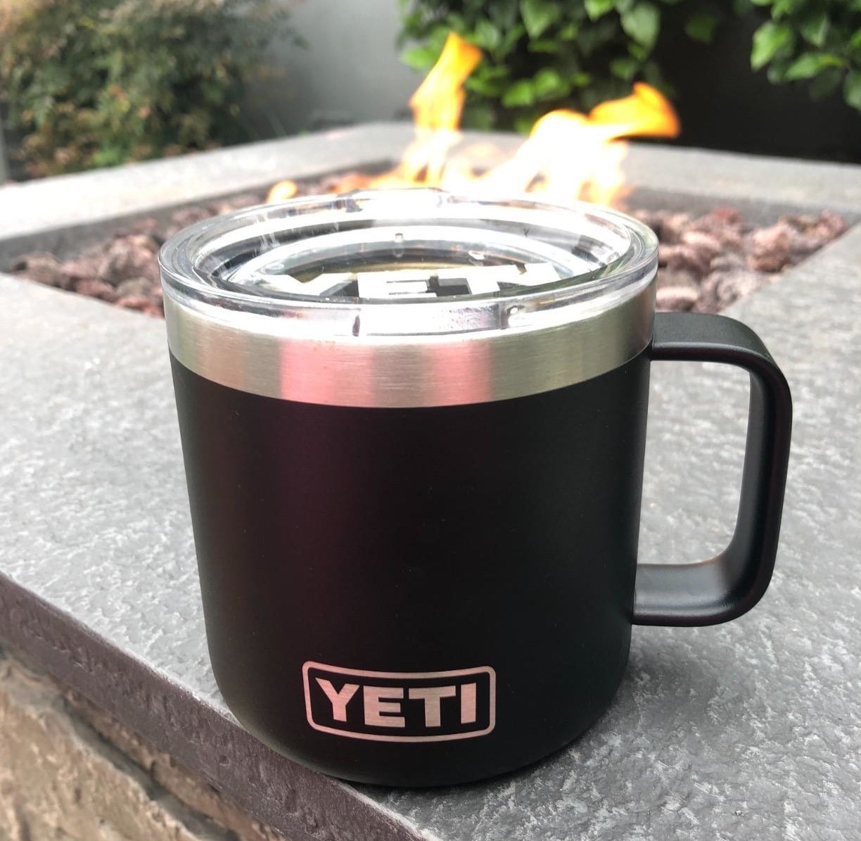 A black Yeti Rambler mug
