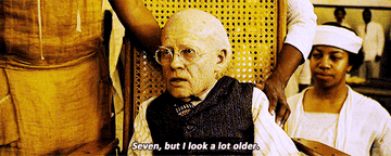 Brad Pitt as Benjamin Button, now an elderly child, who gives his age: &quot;Seven, but I look a lot older&quot;