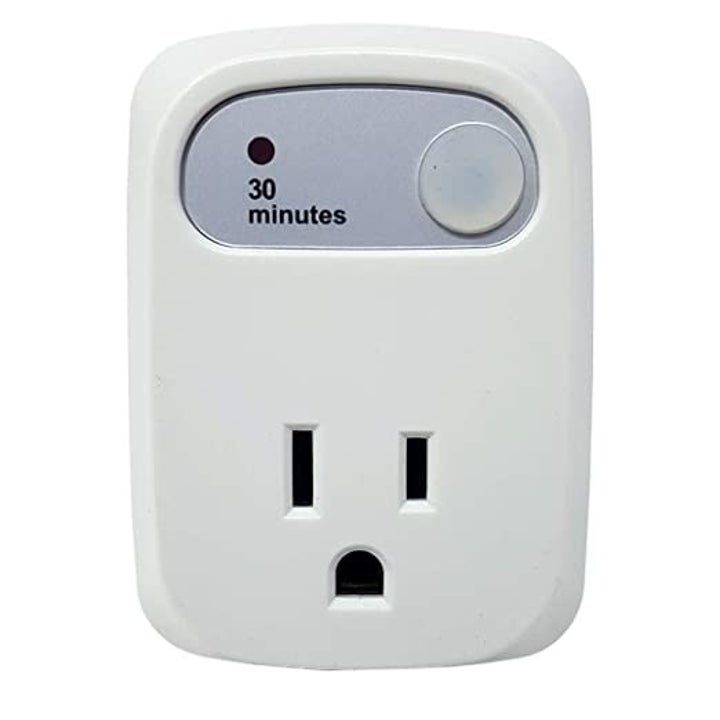 The white three-pronged outlet with a panel that says "30 minutes" 