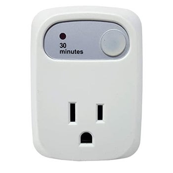 The white three-pronged outlet with a panel that says 