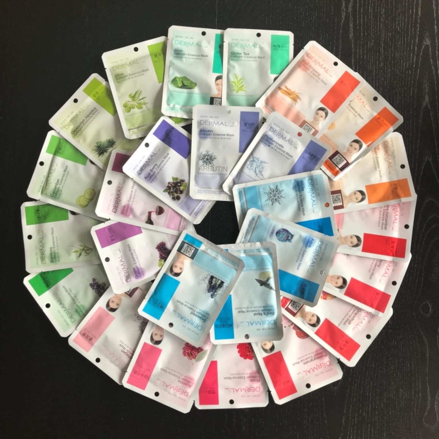 the variety pack of 16 masks laid out on a table in a circle