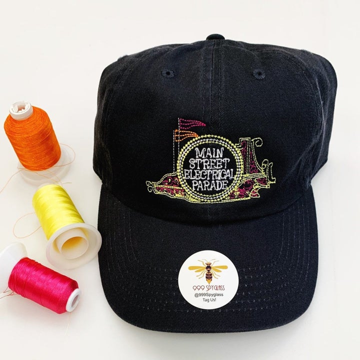 a hat with the main street electrical parade logo on it
