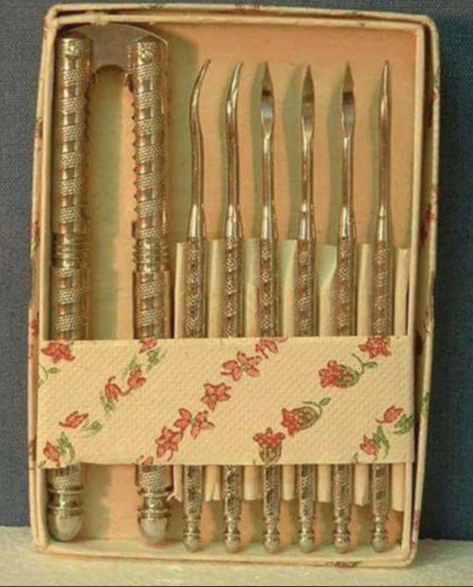 Nutcracker with picks in a flat box