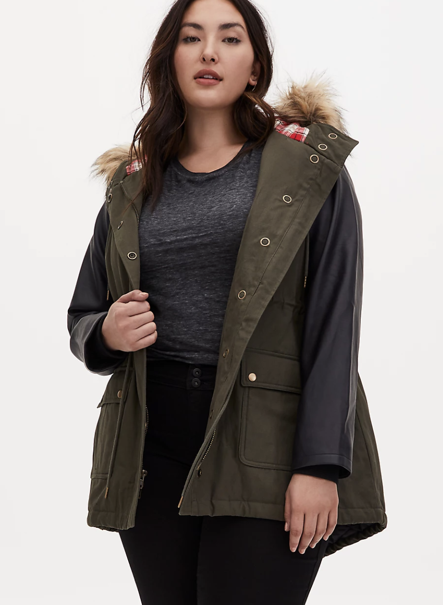 Model wears leather-hooded parka