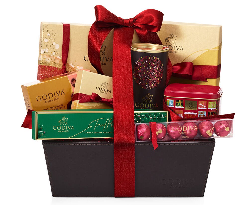 basket filled with various Godiva chocolate goodies