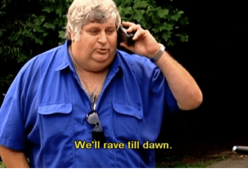 An older man talking on the phone saying 