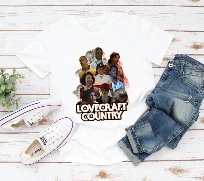 the graphic shirt with the characters of the show Lovecraft Country printed on it