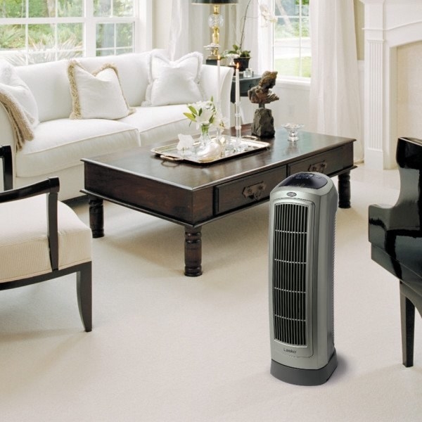 A gray rectangular space heater in a living room 