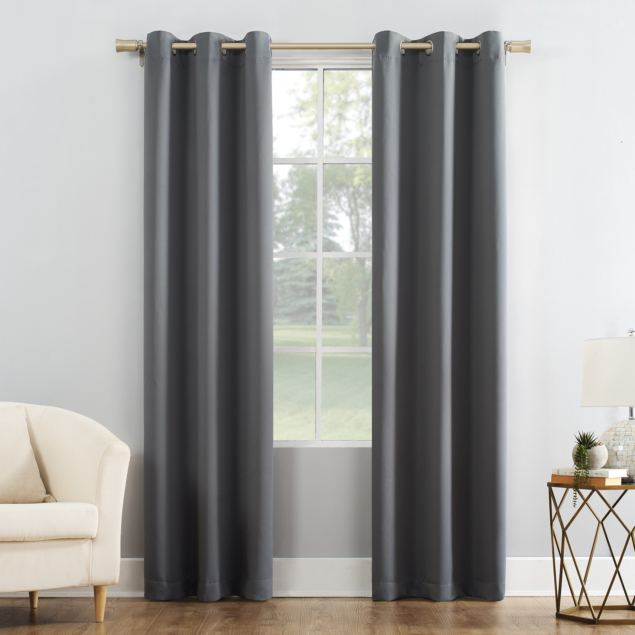 gray blackout curtains in front of a window