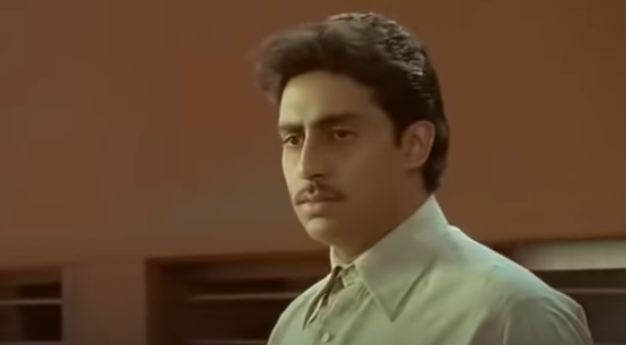 Abhishek bachchan in a still from the movie guru