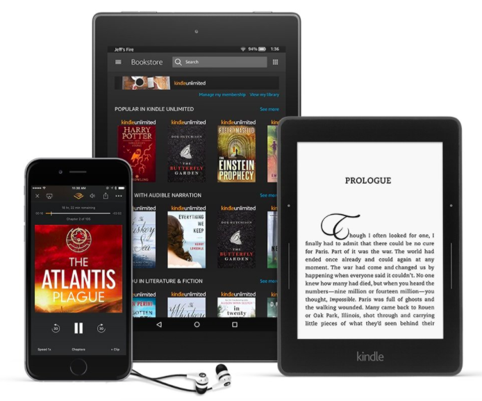 books on a phone and two different sized kindles