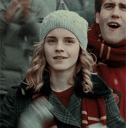 Hermoine clapping in a scene from the movie Harry Potter and The Half Blood Prince