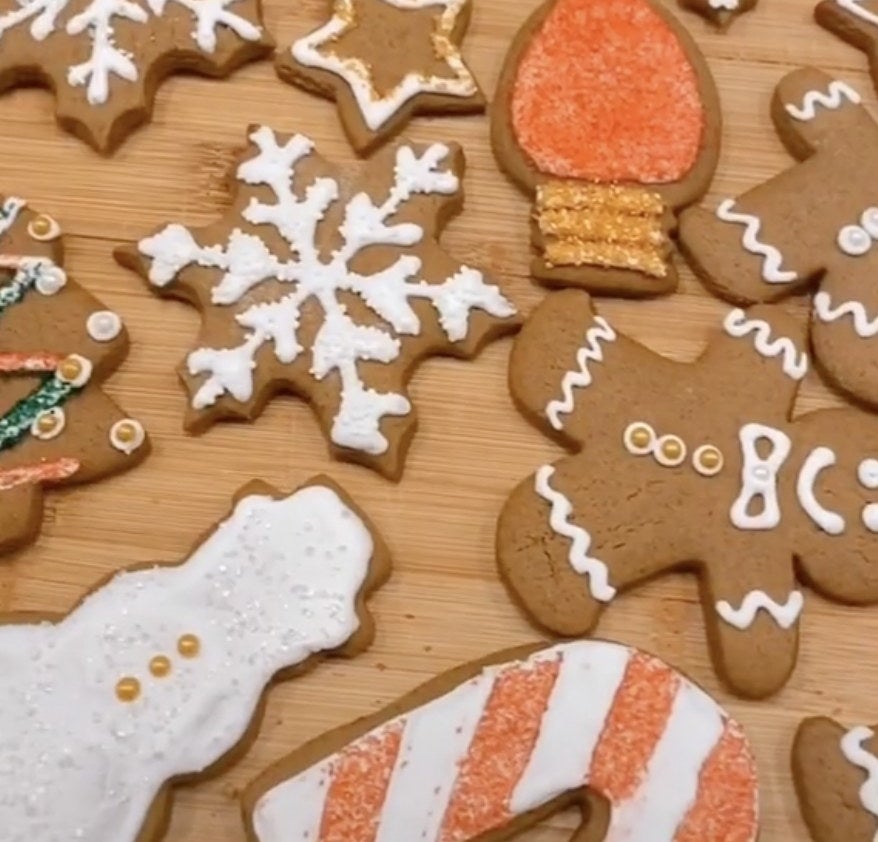 Gingerbread cookies shaped like people, snowflakes and snowmen