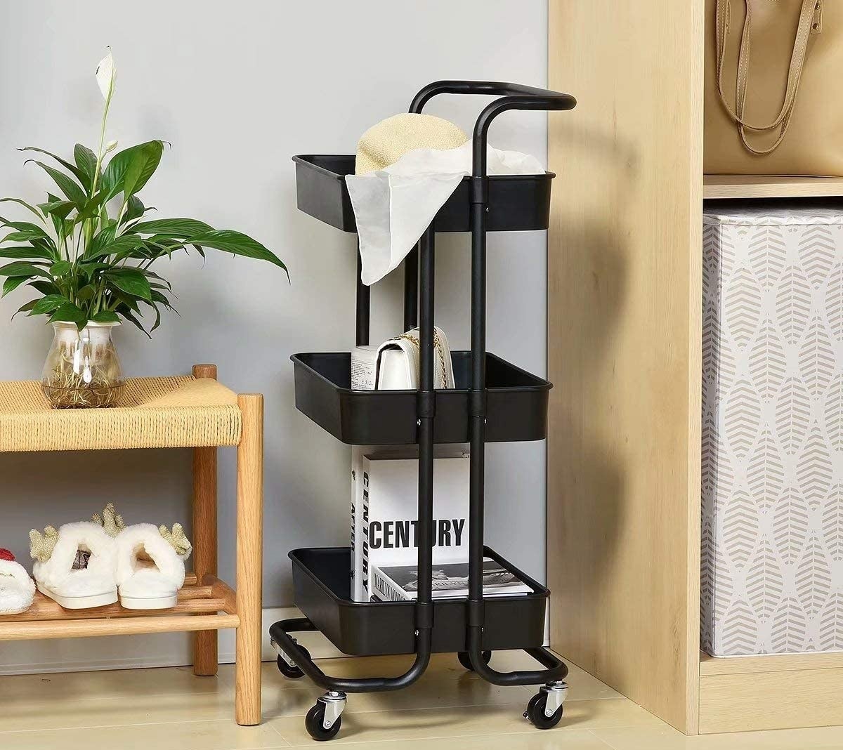 The utility cart beside a shoe bench and a shelf