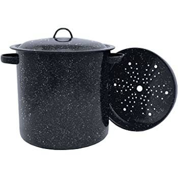 A photo of a large black granite colored tin steamer pot 