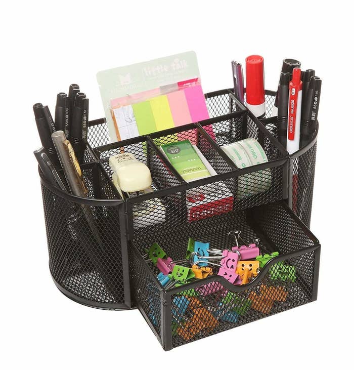 A wire mesh desk organiser