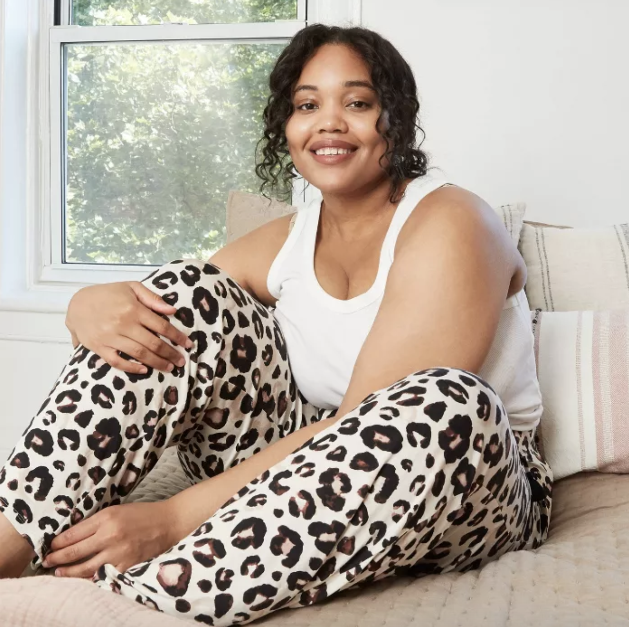 model wearing leopard print bottoms
