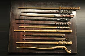 A table full of various magical wands