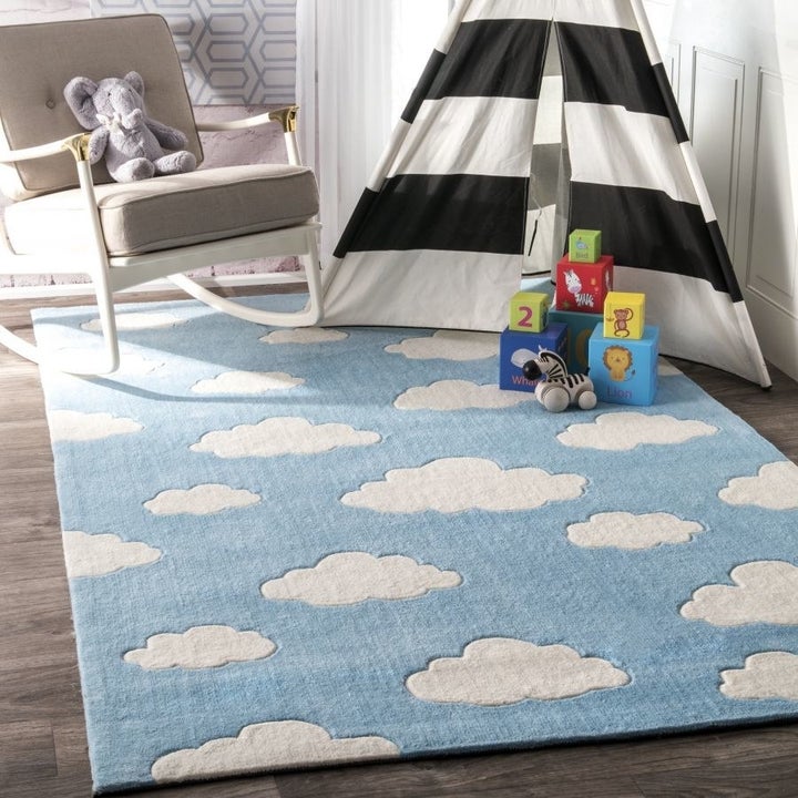 blue rug with white clouds
