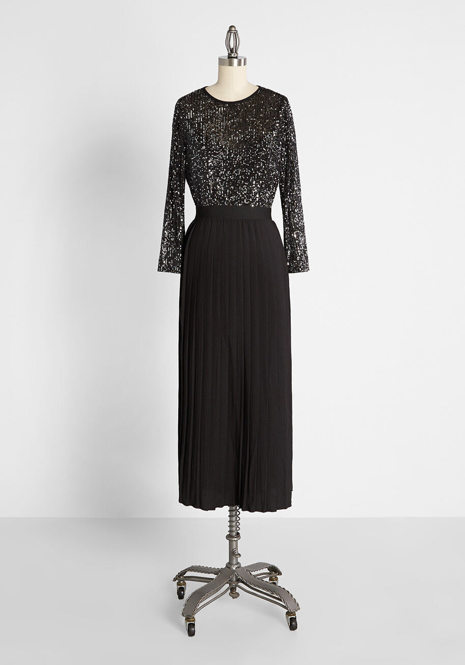 The black maxi dress with glittery long-sleeve top half