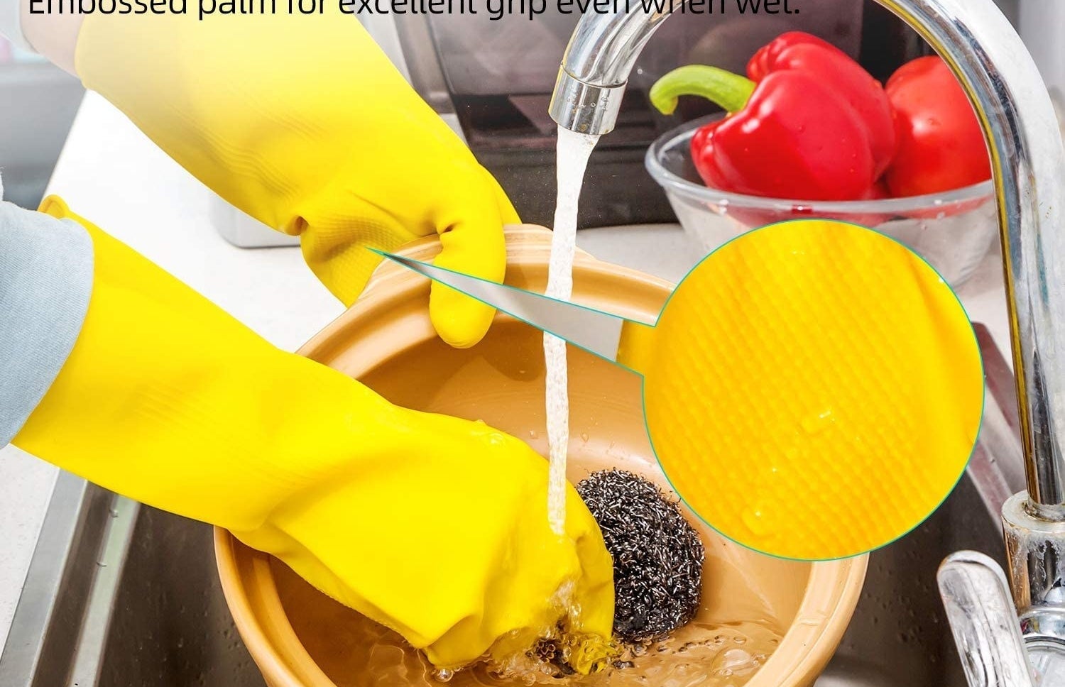 person using a steel wool scrubber with gloves on to clean a bowl