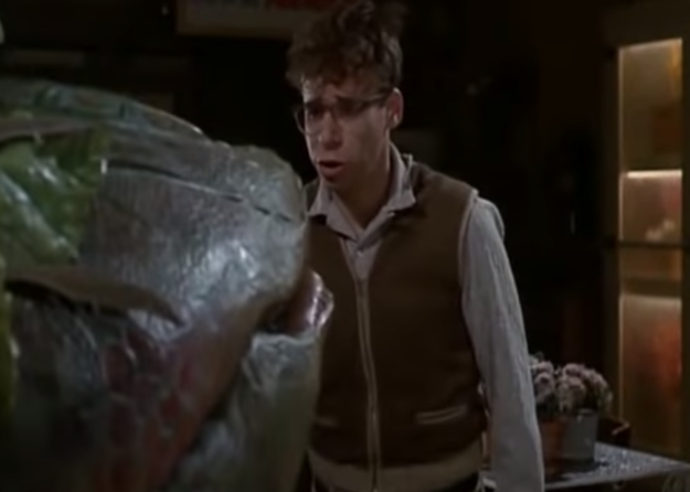 Rick Moranis as Seymour Krelborn and Levi Stubbs as the voice of Audrey II in the movie "Little Shop of Horrors."