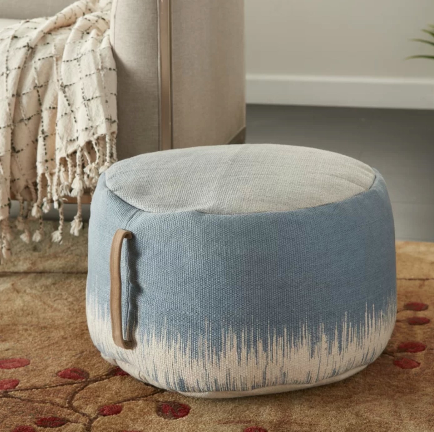The abstract pouf in ocean blue/ ivory