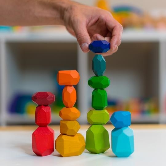 rainbow gem-shaped blocks stacked 