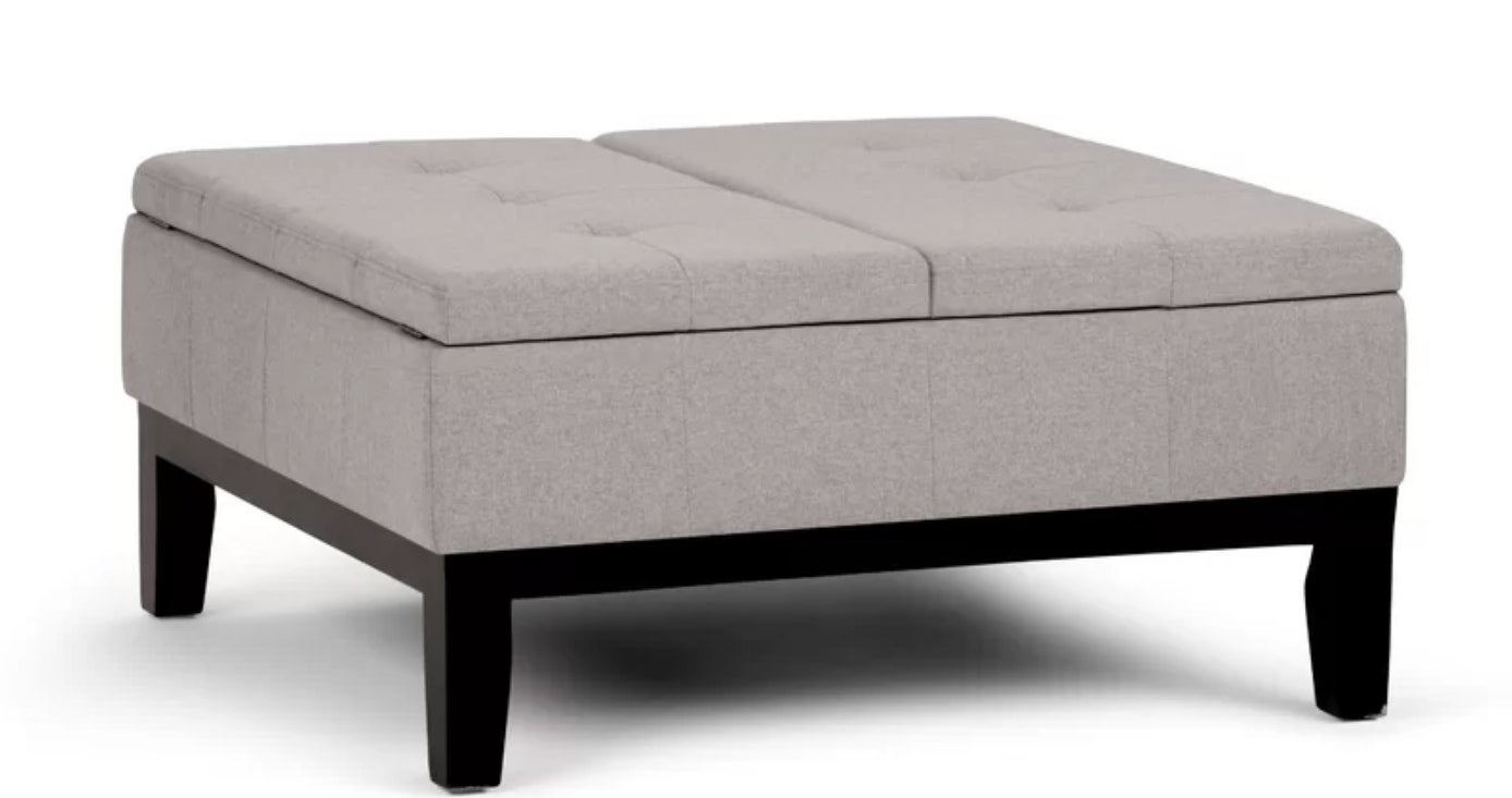 The ottoman in cloud gray faux leather