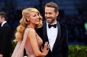 Ryan Reynolds and Blake Lively smiling on the red carpet