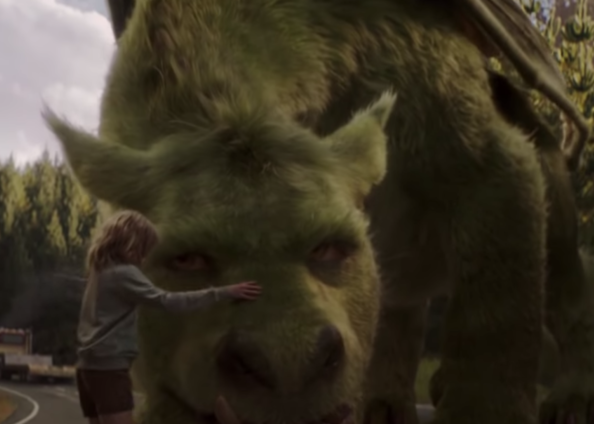 Oakes Fegley as Pete Healy and John Kassir voices Elliot the Dragon in the movie "Pete's Dragon."