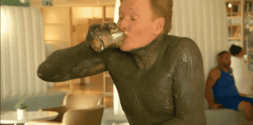 Conan O&#x27;Brien chugging water from a clip of his show