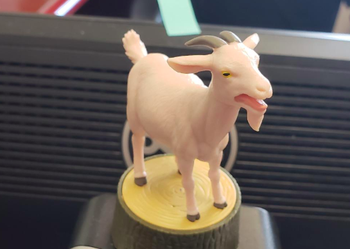 the screaming goat figurine