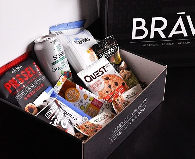An open box filled with a mix of heathy snacks 