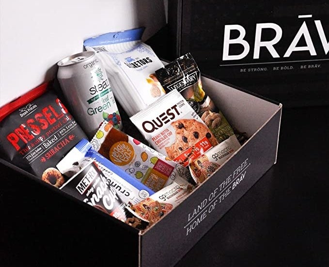 An open box filled with a mix of heathy snacks