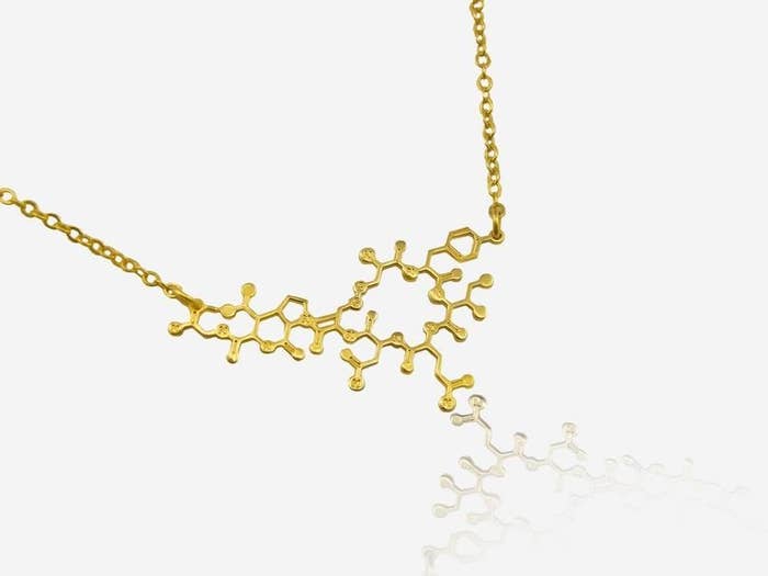 Gold molecule necklace on chain