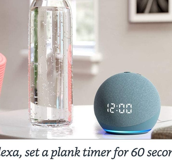 The Echo Dot next to a water bottle