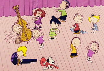 A GIF of the Peanuts dancing from A Charlie Brown Christmas