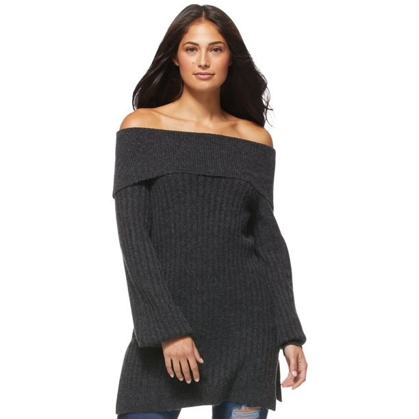 Model in fold over off the shoulder tunic sweater 