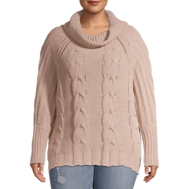 Model in super soft chenille cable knit sweater