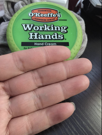 A reviewer's after with their skin moisturized 