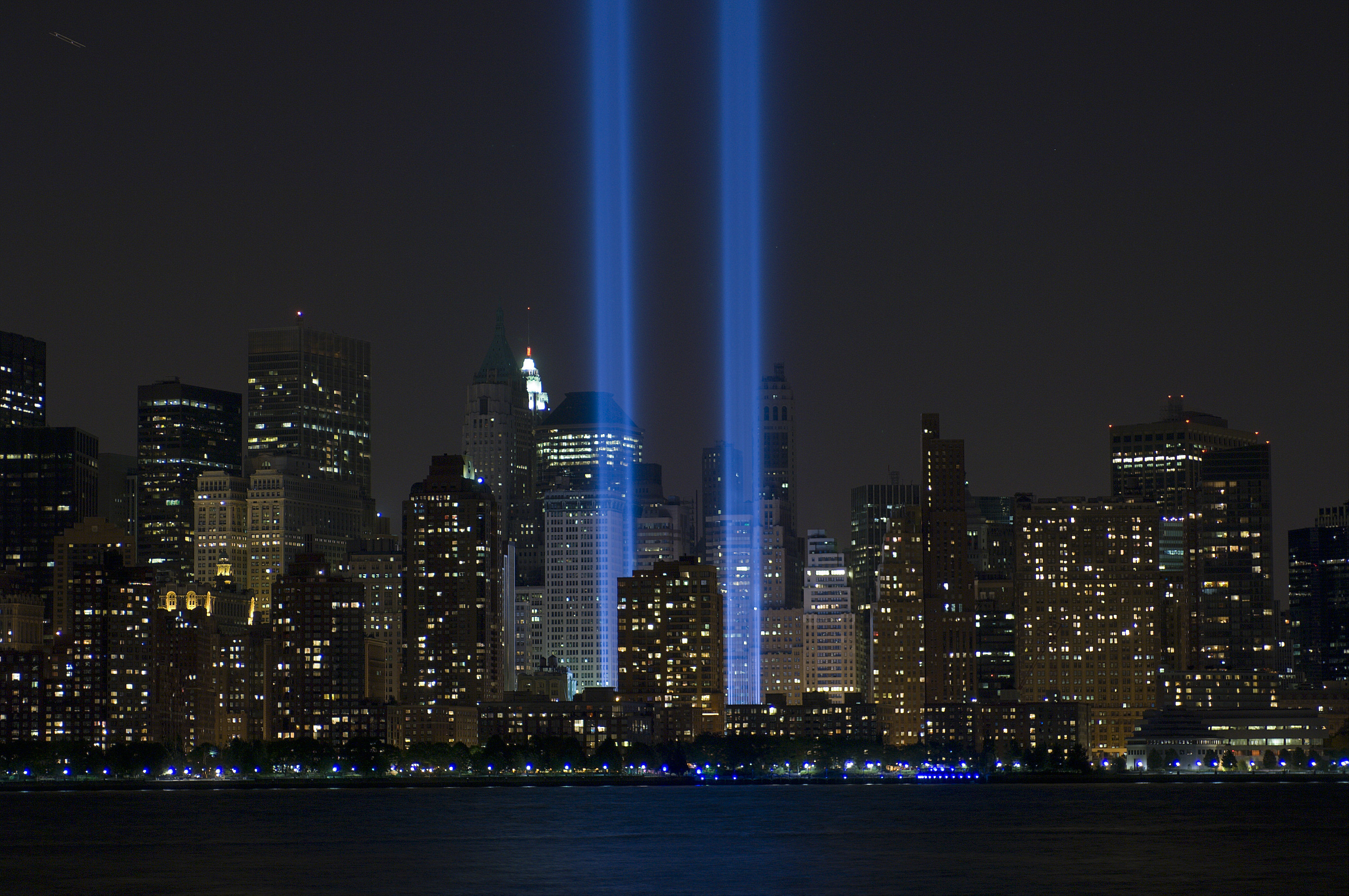 The 9/11 memorial lights shining where the Twin Towers used to stand