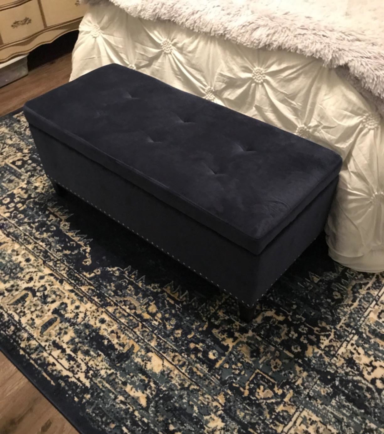 reviewer image of the joveco tufted bench at the foot of a customer&#x27;s bed
